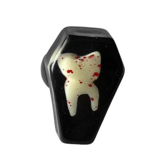 Blood-splattered tooth coffin ring