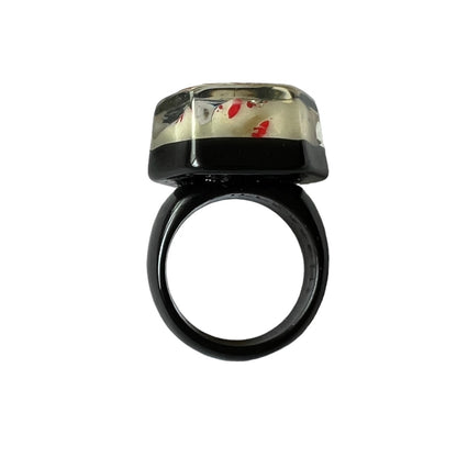 Blood-splattered tooth coffin ring